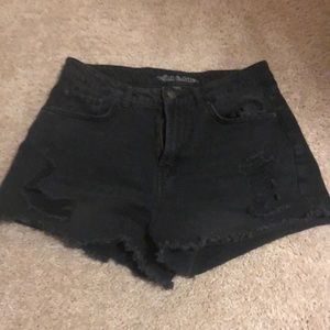 black ripped jean shorts